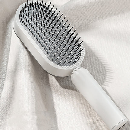 Self-cleaning hair brush – white, brushing
