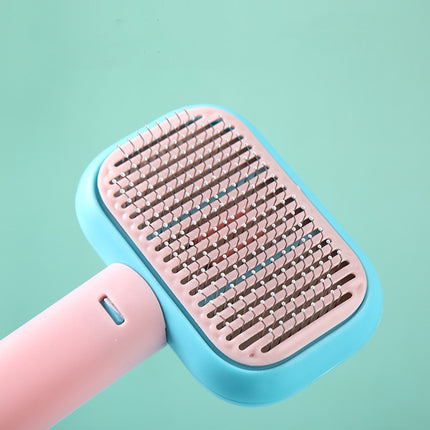 Self-cleaning pet grooming brush – pink, top view