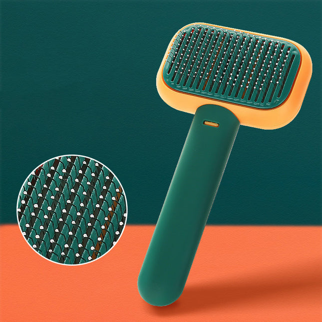 Self-cleaning pet grooming brush – green with pins close-up