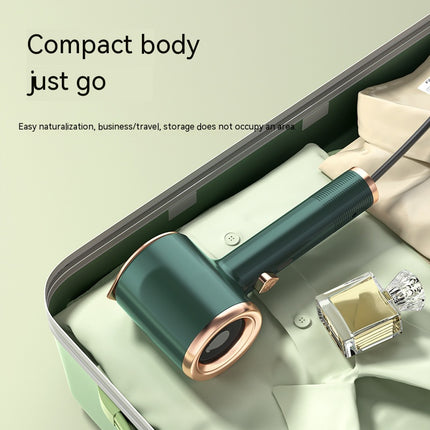 Mini handheld garment steamer – green, compact size