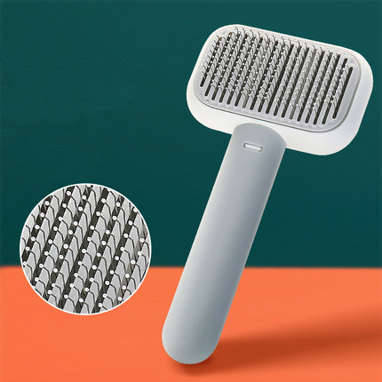 Self-cleaning pet grooming brush – grey with pins close-up