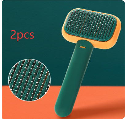 Self-cleaning pet grooming brush – green, close-up of metal pins
